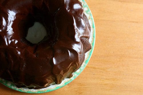 Boyfriend's mom got me a Gingerbread House shaped Bundt pan for Christmas.  I hate the taste of Gingerbread, so I made a chocolate chip banana pound  cake instead. How cute! : r/Baking