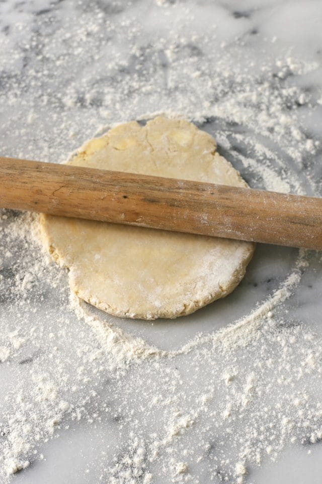 rolling out a pie crust
