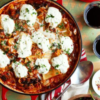 Easy lasagna recipe baked in a skillet topped with ricotta