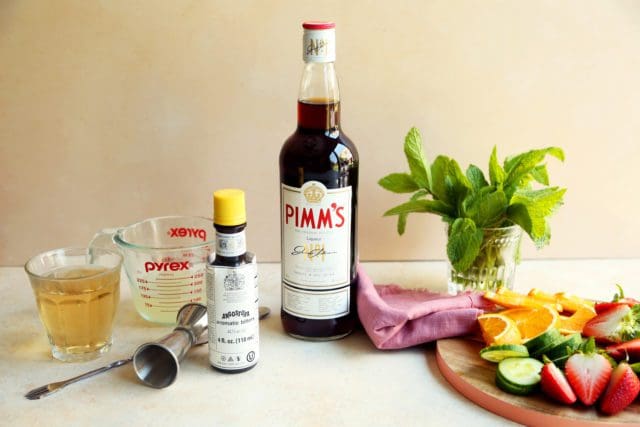 Pimm's No 1 bottle and Pimm's Cup cocktail ingredients
