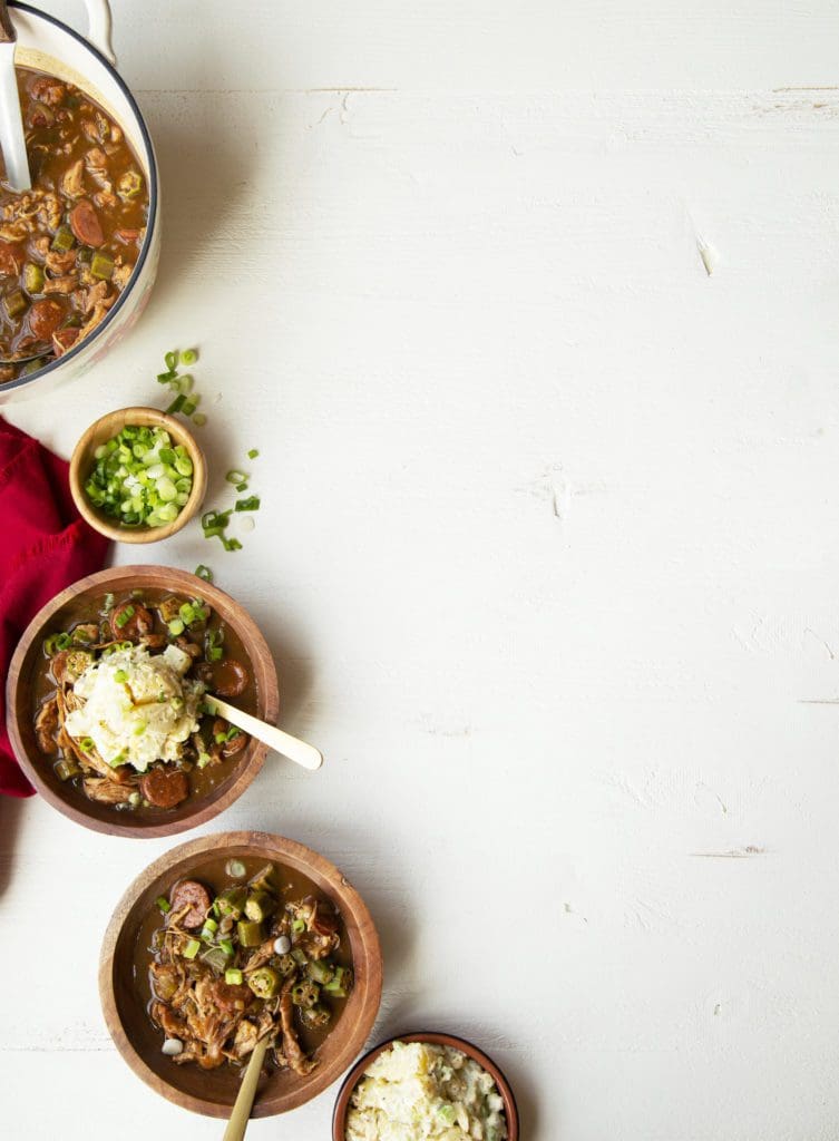 Two small bowls of chicken and andouille gumbo