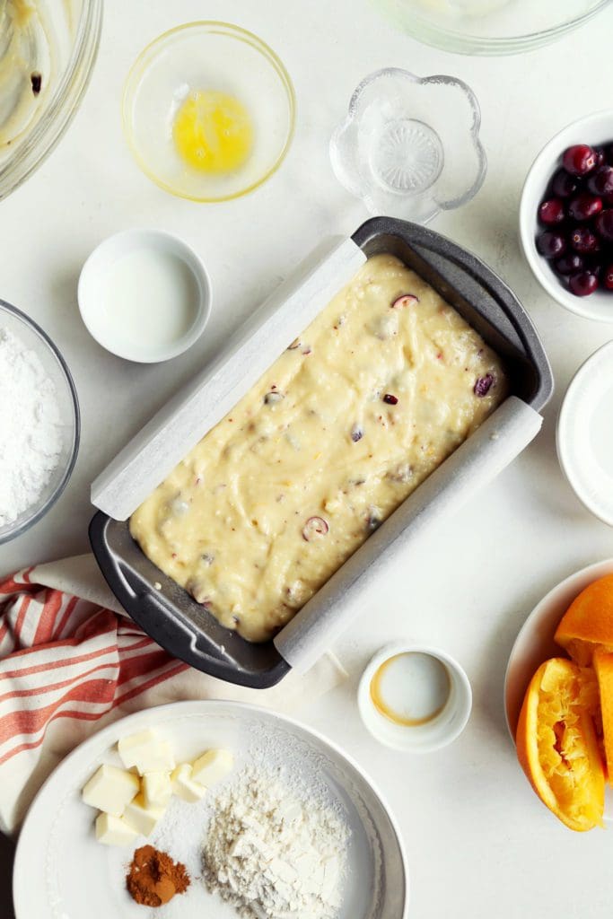 Cranberry orange batter in a loaf pan.