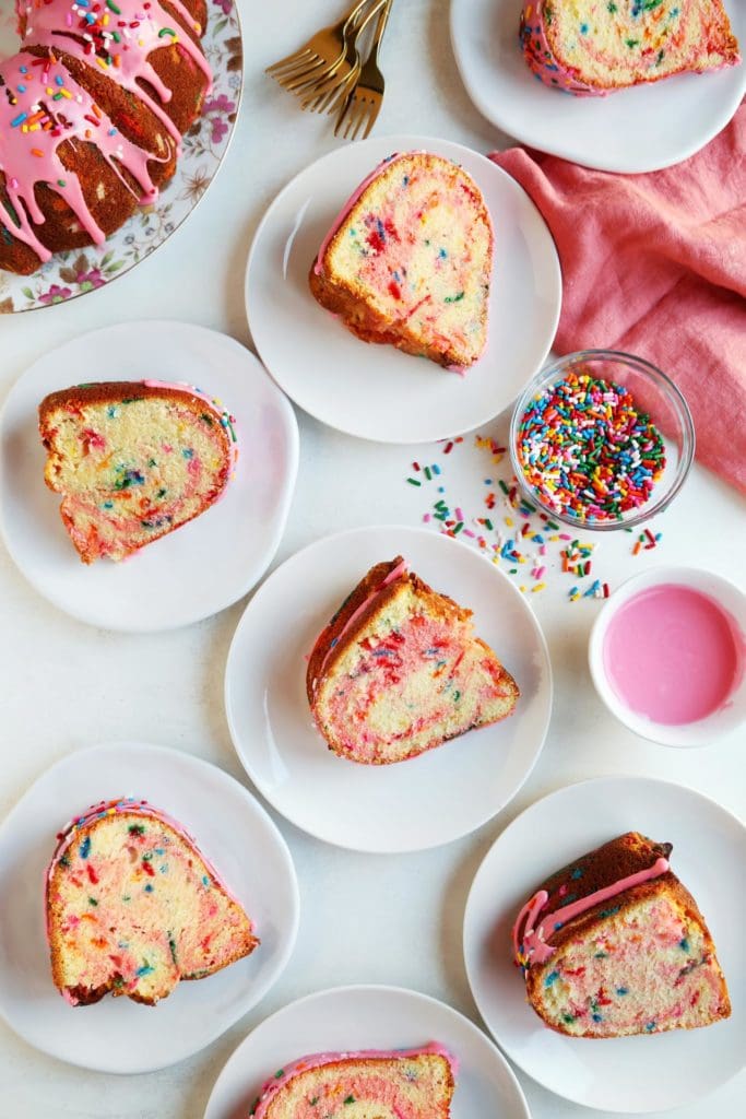 Sliced and plated funfetti cake slices.