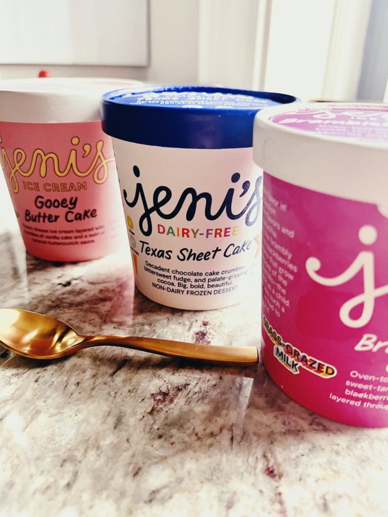Jeni's Ice Cream review three pints on counter.
