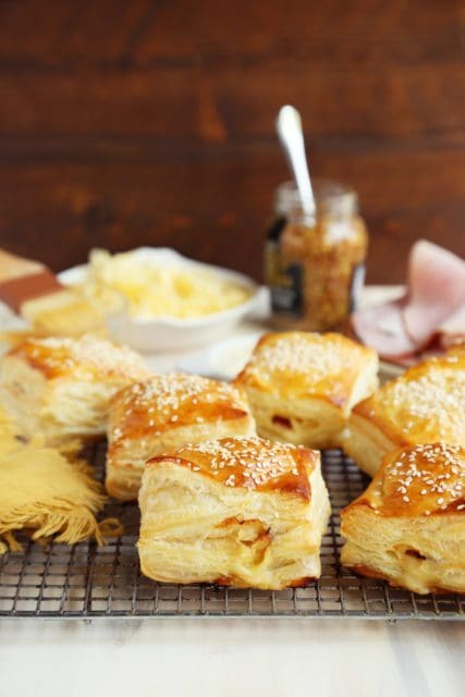 Pile of baked croissants on rack just like starbucks ham and cheese croissant recipe.