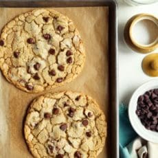 Two huge small-batch chocolate chip cookies.