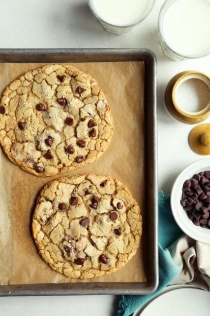 Two huge small-batch chocolate chip cookies.