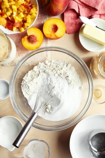 whisking together dry ingredients in medium bowl for easy scone recipe