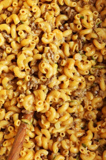 Texture of homemade hamburger helper in pot.