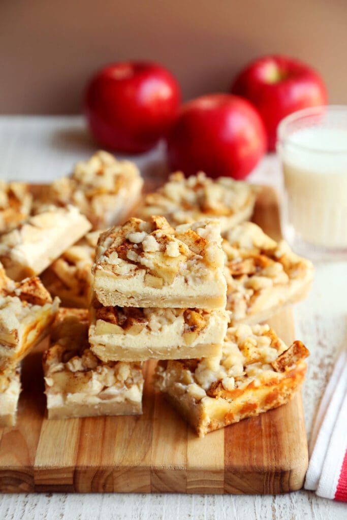 stacked sliced apple cheesecake bars