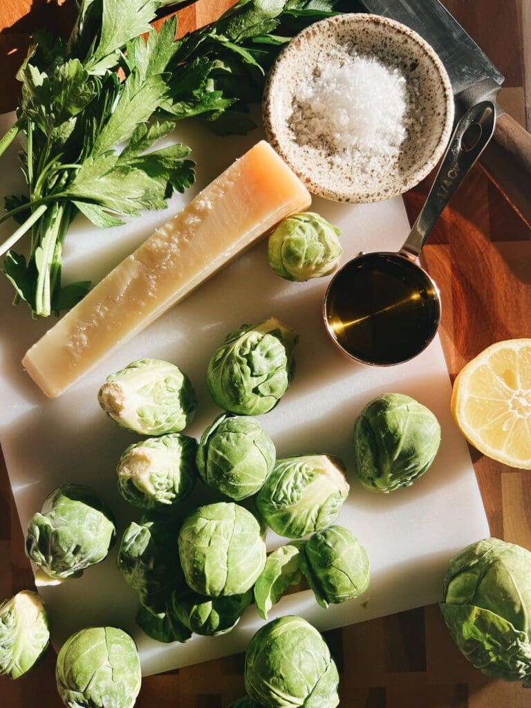 ingredients for brussels sprouts on a cutting board