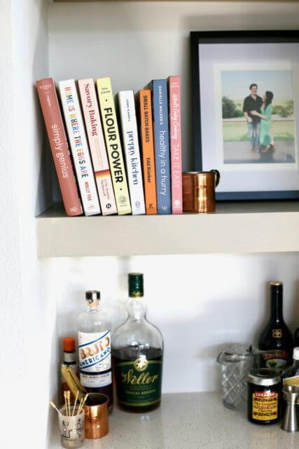 Stack of cookbooks on shelf