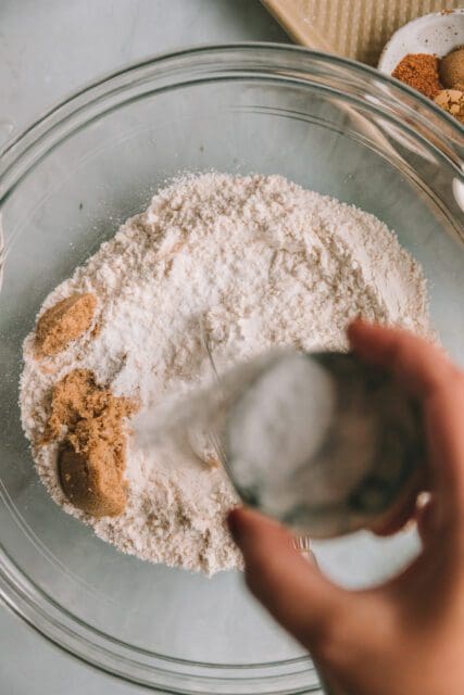 adding powdered sugar to dry ingredients