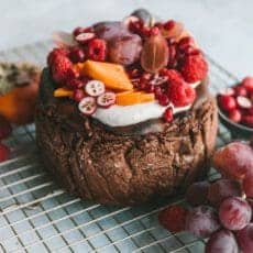 Chocolate basque cheesecake topped with fruit.