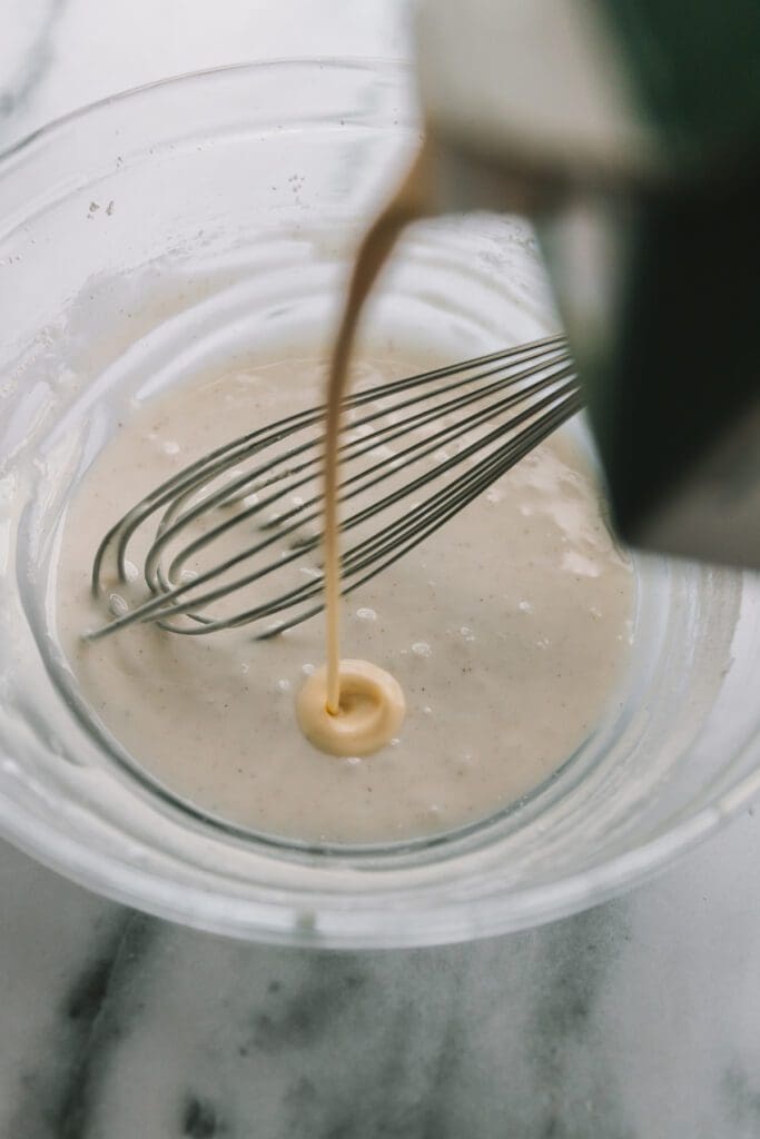 Adding a splash of eggnog to cookie glaze.