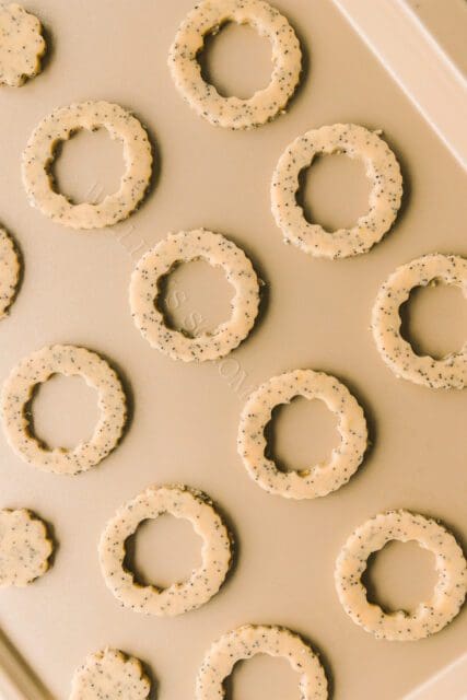 Linzer cookies on baking sheet.