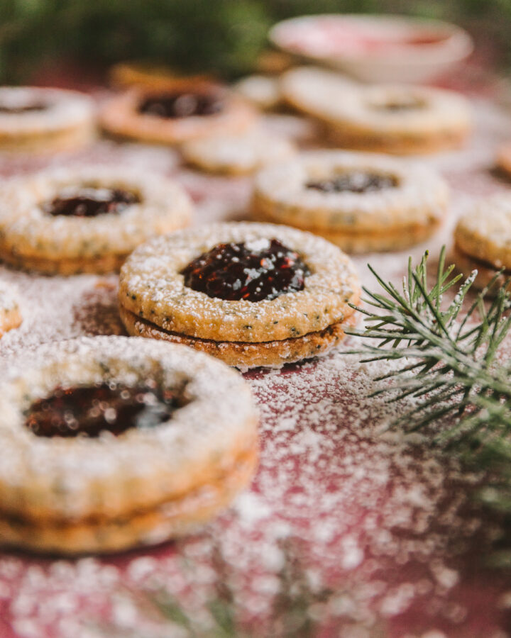 Dusted linzer cookies dusted with powdered sugar.