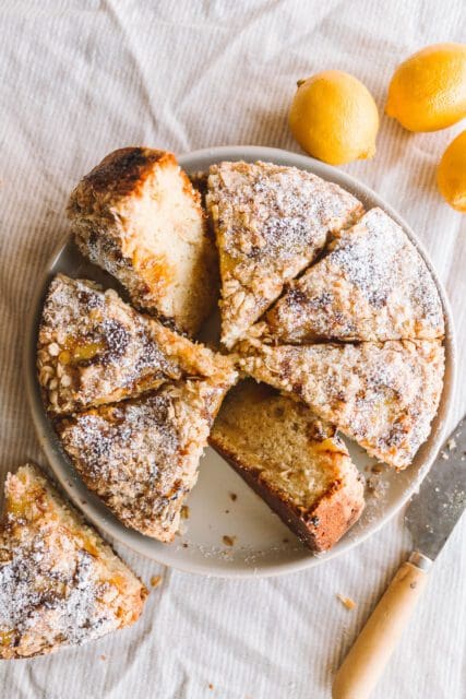 lemon crumb cake slices on a cake plate