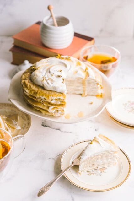 overhead view of crepe cake with a generous slice removed