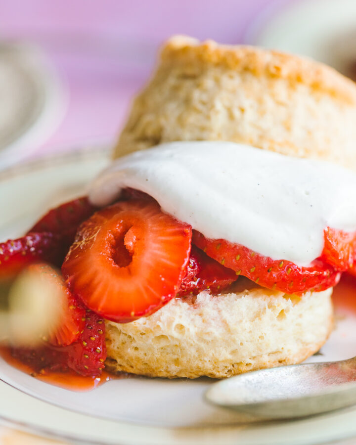 close up of strawberry shortcake recipe with soft whipped cream