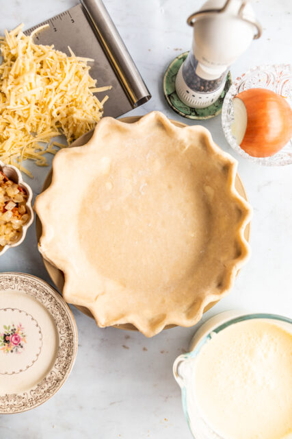 pie crust rolled out in a pie tin for quiche Lorraine